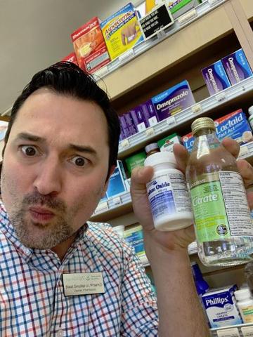 Pharmacist with laxative magnesium